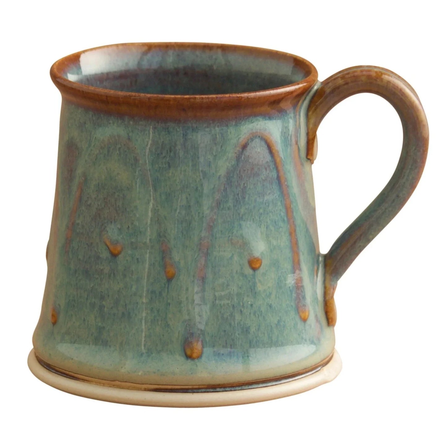 Handcrafted Kilkenny pottery cylinder mug with green and brown glaze, featuring a curved handle and decorative dots