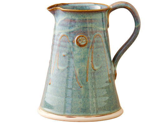 Handcrafted ceramic pottery jug in green glaze with Celtic motif, Kilkenny tradition