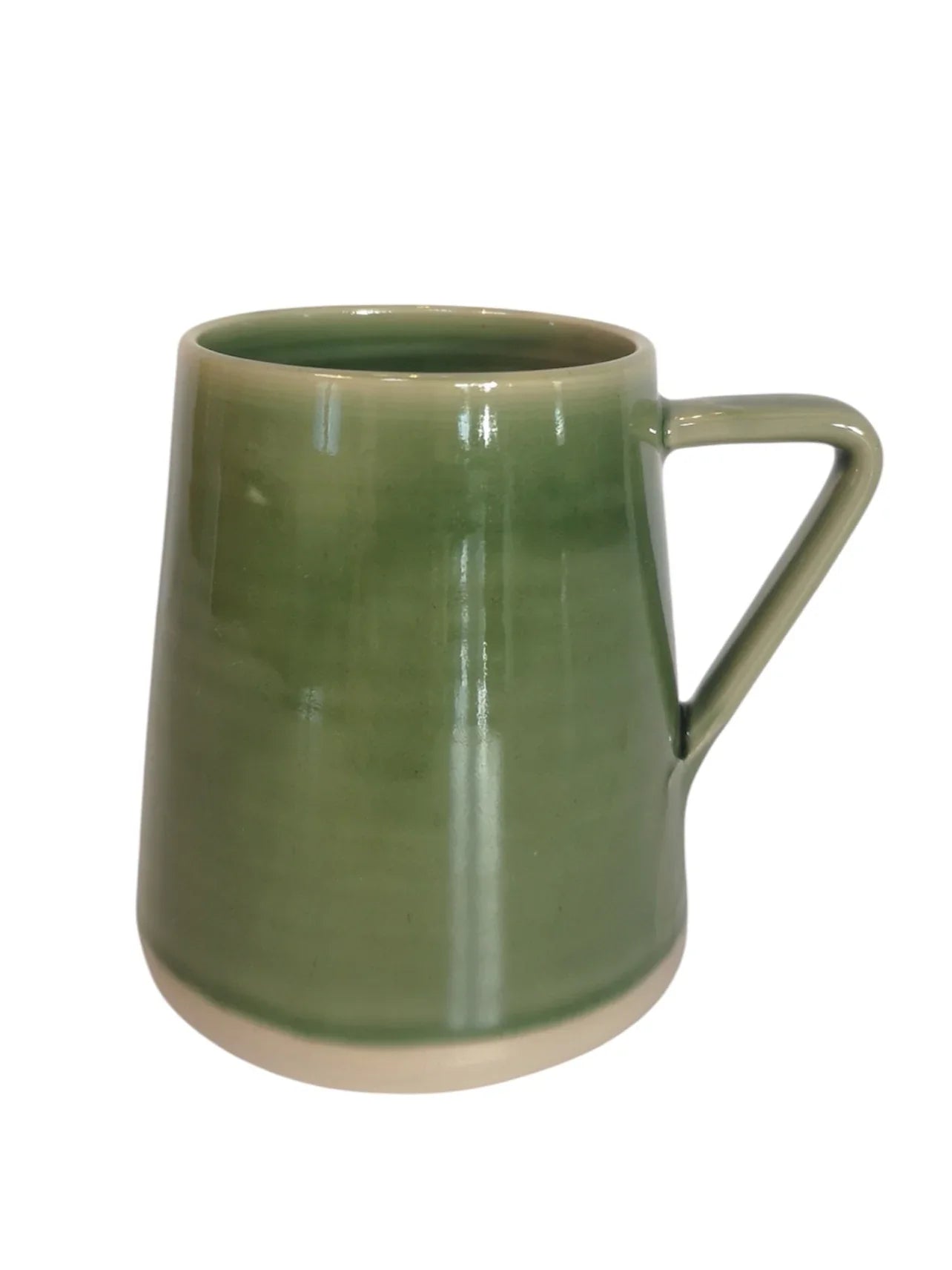 Handcrafted green ceramic pottery mug with angular handle and glossy finish from Kilkenny