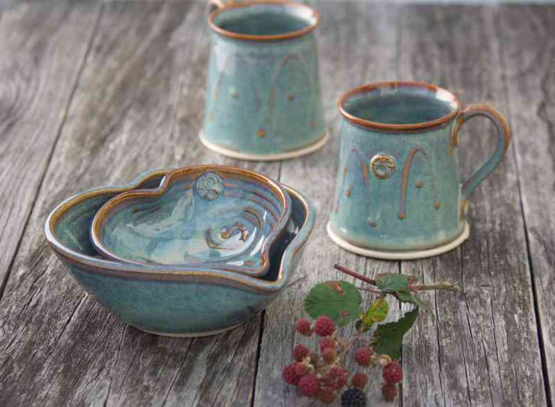 Heart Shaped bowl for serving snacks or holding trinkets. Made by Castle Arch Pottery. Pottery Cycinder mugs and berries